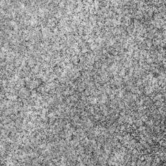 Gray granite stone wall background.
