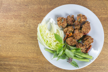 fried spicy minced meat salad, lap.