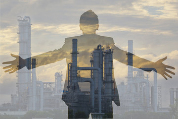 Double exposure of business man and Oil refinery factory plant or petrochemical plant