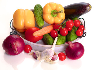 Fresh autumn vegetables on a white background