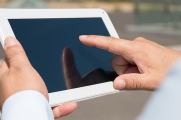 Businessman using a tablet