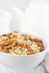 Oatmeal flakes with nuts in bowl