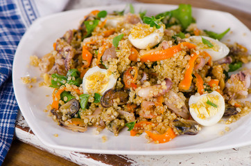 Seafood salad with quinoa and quail eggs.