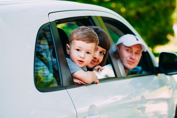 Happy family at the new car. Automobile.