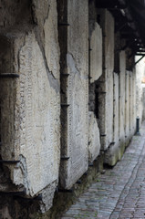 Medieval tombstones on the wall of Catherine's Alley, Tallinn, Estonia