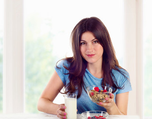 Young woman with a healthy breakfast