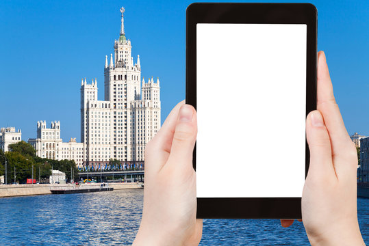 tablet with cut out screen and Moscow skyscraper