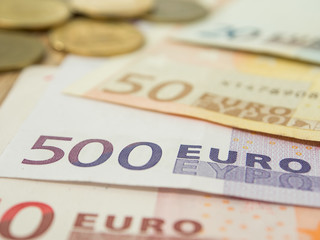 euro banknote and coin