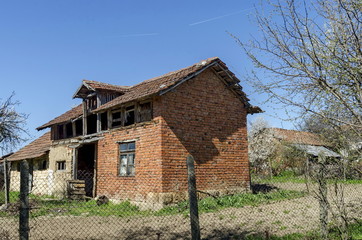 Fototapeta na wymiar Old secondary house in small town yard, Bulgaria 