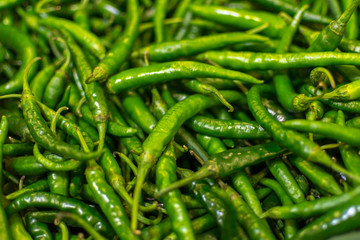 Close-up of Fresh Green Chilli Peppers
