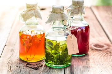 Healthy herbs in bottles as an alternative cure