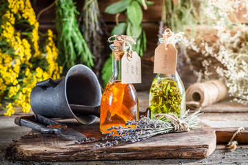 Homemade herbs in bottles as an alternative cure