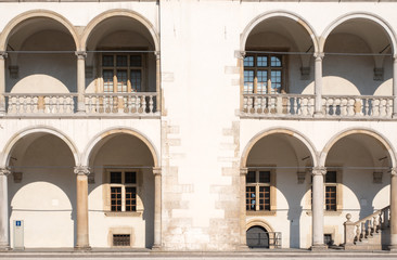 Fototapeta na wymiar White building with balconies and strairs