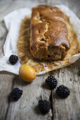 Plumcake with blackberries and plums
