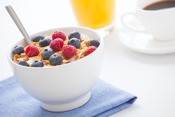 Healthy breakfast with fresh fruit, orange juice and cof