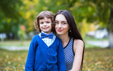 Obraz premium Portrait of fashionable baby boy and his mother
