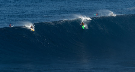 MAUI, HAWAII, USA-DECEMBER 10, 2014: Unknown surfers are riding