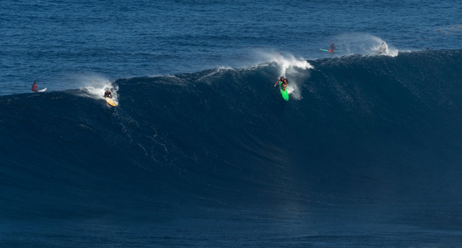MAUI, HAWAII, USA-DECEMBER 10, 2014: Unknown surfers are riding