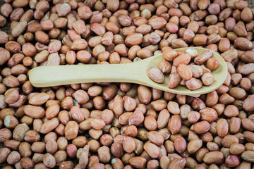 fresh ground nuts in spoon