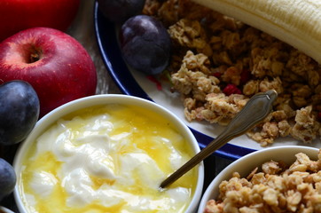 Fruit muesli with yogurt and cereals for breakfast