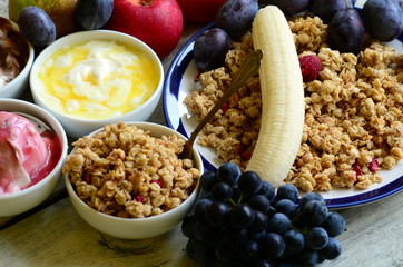 Fruit muesli with yogurt and cereals for breakfast