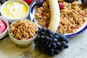 Fruit muesli with yogurt and cereals for breakfast