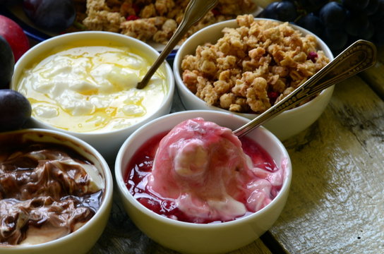 Fruit muesli with yogurt and cereals for breakfast