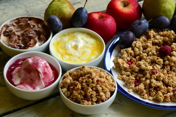 Fruit muesli with yogurt and cereals for breakfast