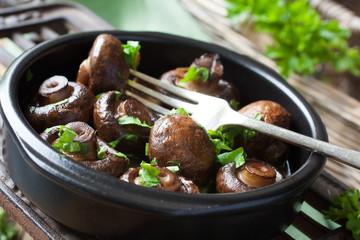 Baked champignons mushrooms