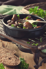 Baked champignons mushrooms
