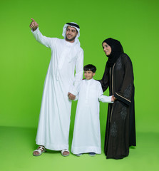 Emirati family looking with curiosity.