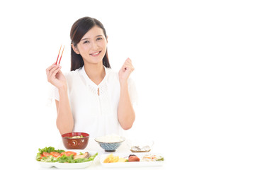 食事を楽しむ女性　