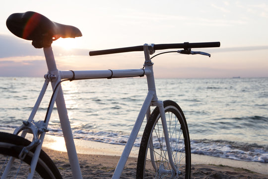 Classic fixed gear bicycle on sea background