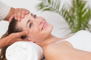 Obraz na płótnie Canvas Happy woman receiving neck massage 