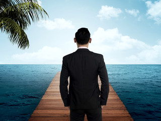 Fototapeta premium Business person on the wooden pier