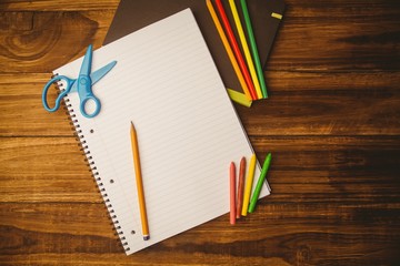 School supplies on desk with copy space