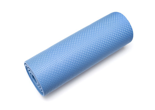 Blue yoga mat for exercise, isolated on white background.