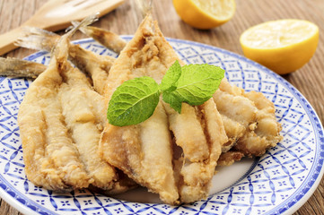 spanish boquerones fritos, battered and fried anchovies typical