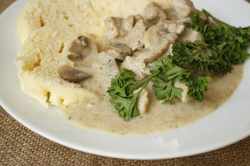 pork dumplings mushroom cream sauce detail