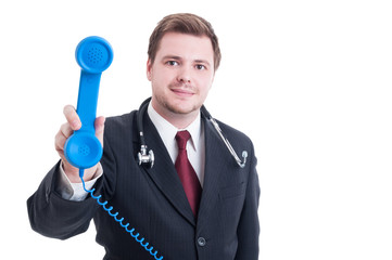 Naklejka premium Hospital assistance or support person holding phone