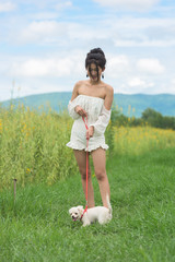 asian young woman with her dog