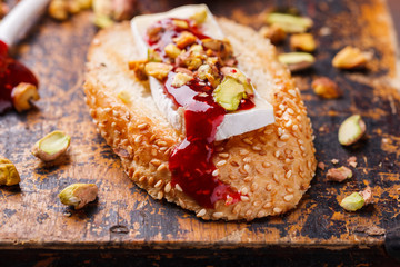 Bruschetta with brie cheese and raspberry jam.selective focus