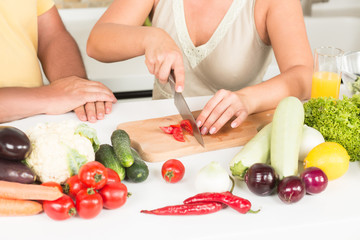 Woman cutting tomatoes