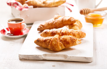 breakfast with croissants and coffee