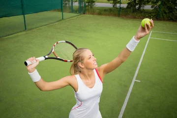 Fotobehang Woman in tennis practice © Kaspars Grinvalds