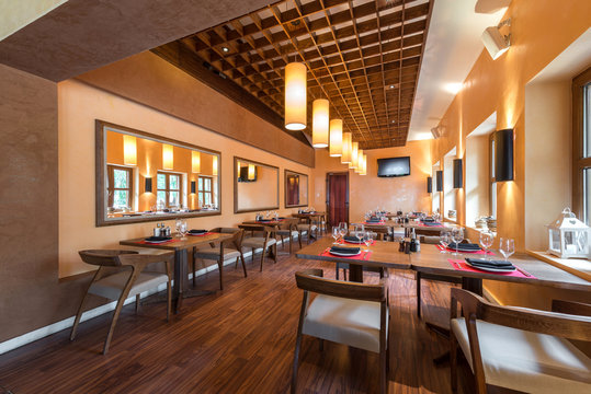 Restaurant room with wooden furniture