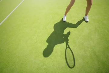Rolgordijnen Tennis player on the court © Kaspars Grinvalds