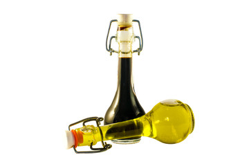 Two bottles of wine vinegar and olive oil