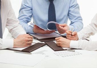 Business people discussing a new project, white background