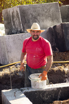 male construction worker working on the construction of the foun